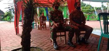 Satuan Tugas TMMD Kodim Bojonegoro Berkomunikasi Dengan Kasi Trantib Linmas Tambakrejo